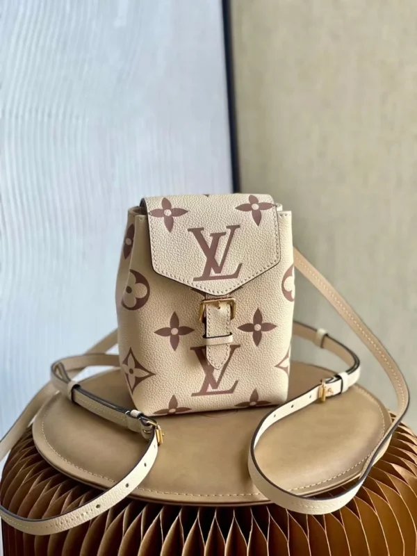 backpack-bicolor-monogram-empreinte-leather-in-cream