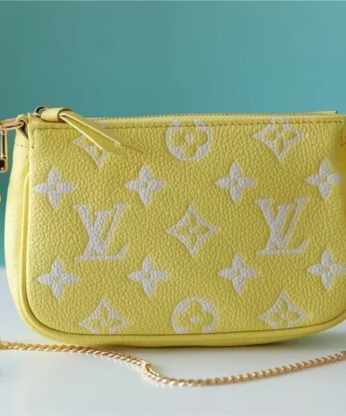 louis-vuitton-mini-pochette-accessoires-monogram-empreinte-leather-m46129