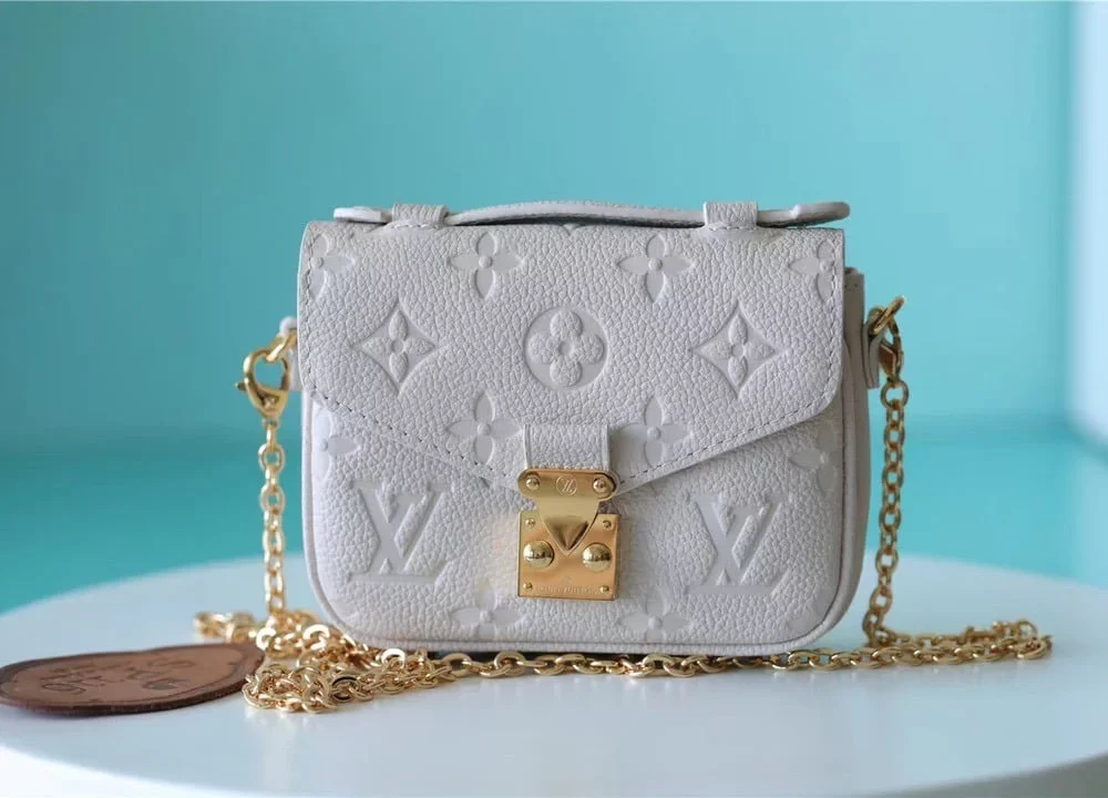 louis-vuitton-replica-micro-metis-monogram-empreinte-leather-m81390