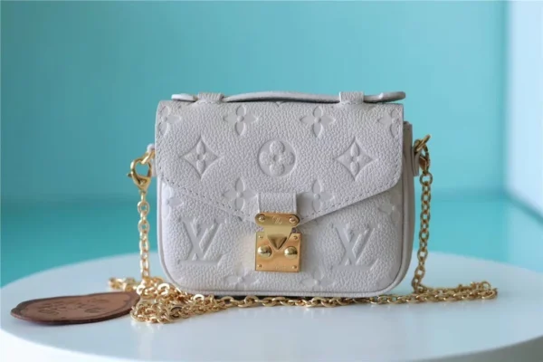 louis-vuitton-replica-micro-metis-monogram-empreinte-leather-m81390