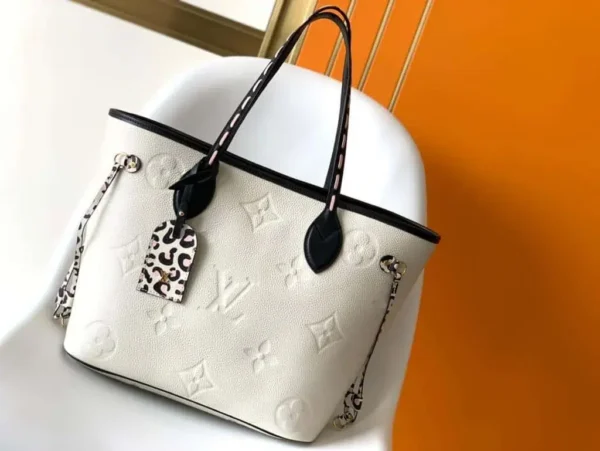 louis-vuitton-replica-neverfull-mm-wild-at-heart-monogram-empreinte-leather-m58525