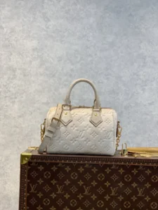 louis-vuitton-replica-speedy-bandouliere-20-monogram-empreinte-pale-beige-m46163