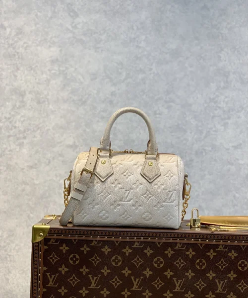 louis-vuitton-replica-speedy-bandouliere-20-monogram-empreinte-pale-beige-m46163