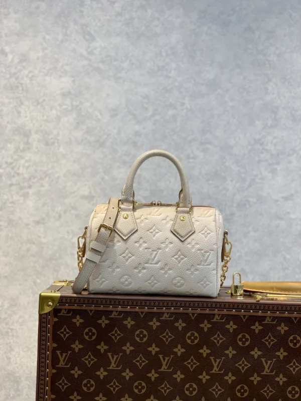 louis-vuitton-replica-speedy-bandouliere-20-monogram-empreinte-pale-beige-m46163