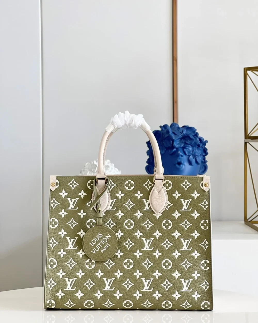 onthego-mm-monogram-empreinte-khaki-green-m46060