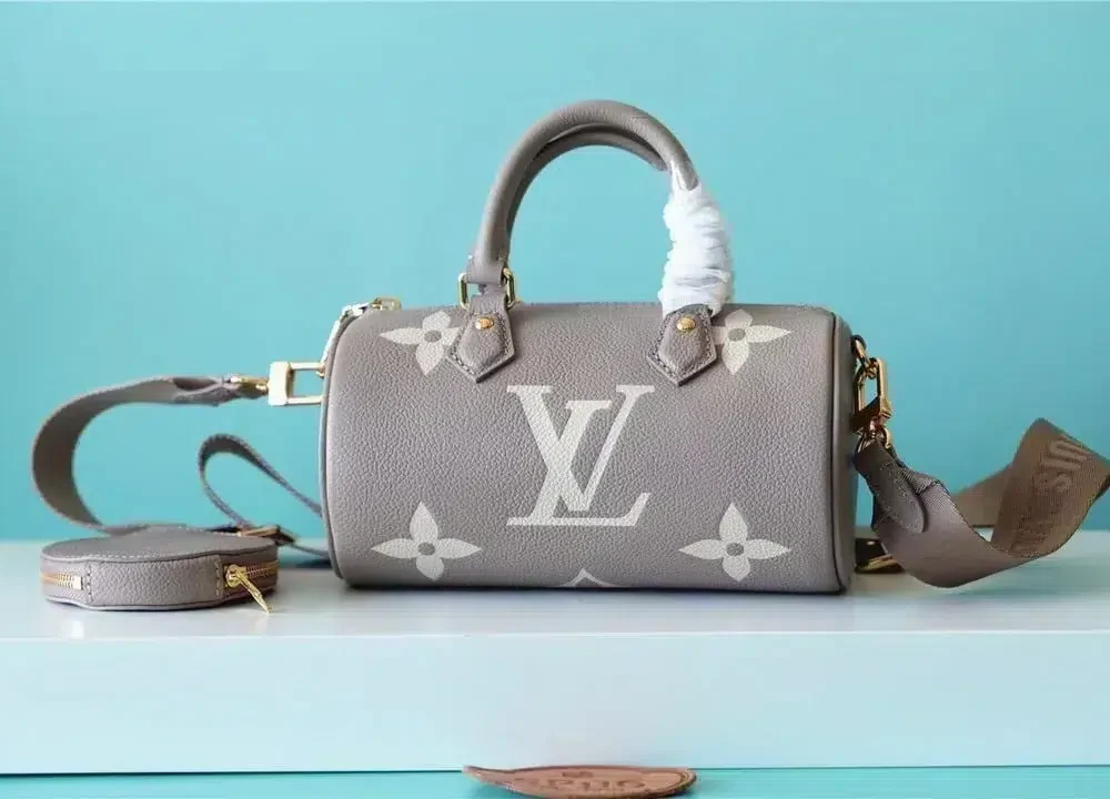 papillon-bb-monogram-empreinte-tourterelle-creme-m46031