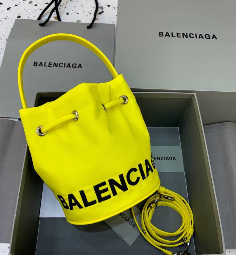 Balenciaga Le Cagole Medium Bucket Bag In Yellow, For Women, Women's Bags 7in/18cm