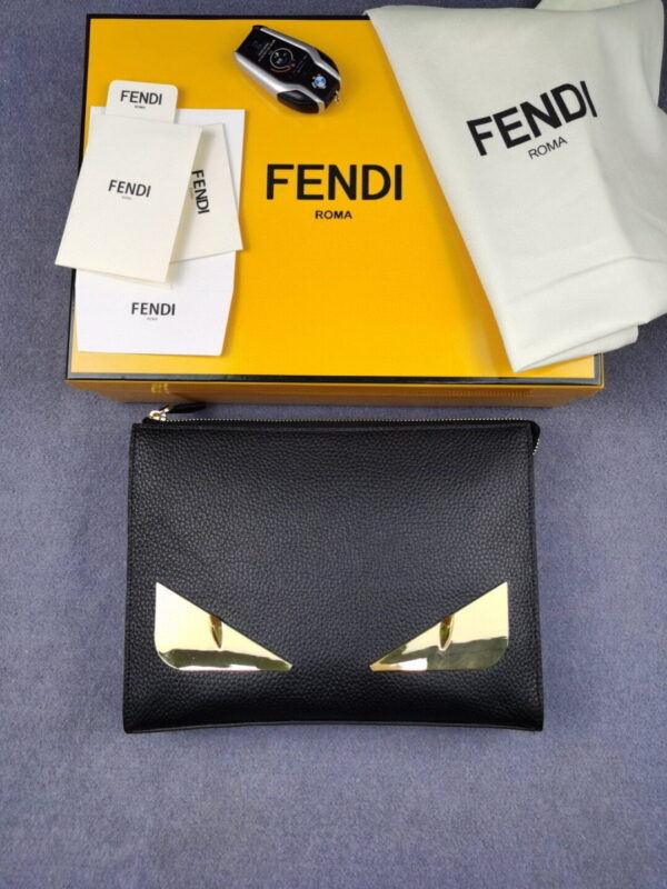 Fendi Monster Eyes Flat Zip Pound Clutch in Black with Gold Toned Hardware For Men 27cm/10.5in FF