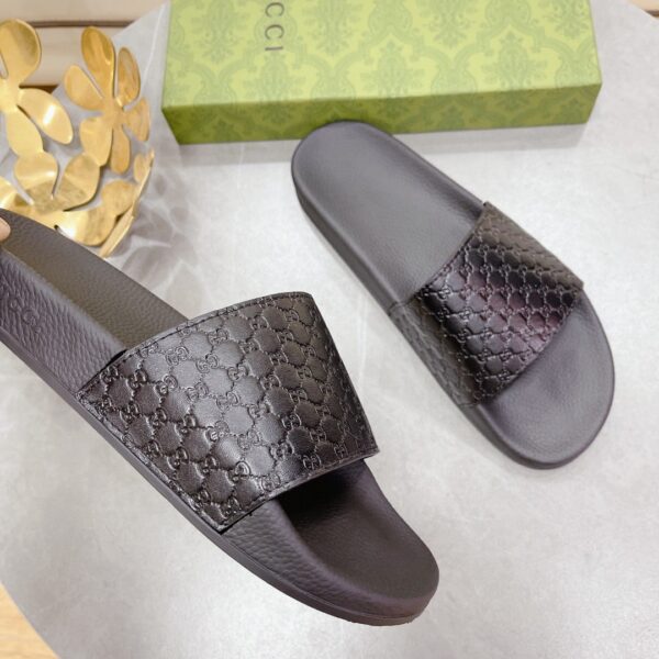Gucci Women's Embossed GG Slide Sandal Black For Women 407345