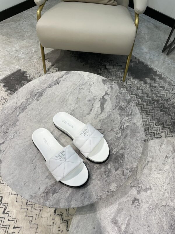 Prada Embossed Logo Quilted Slides White For Women PRD