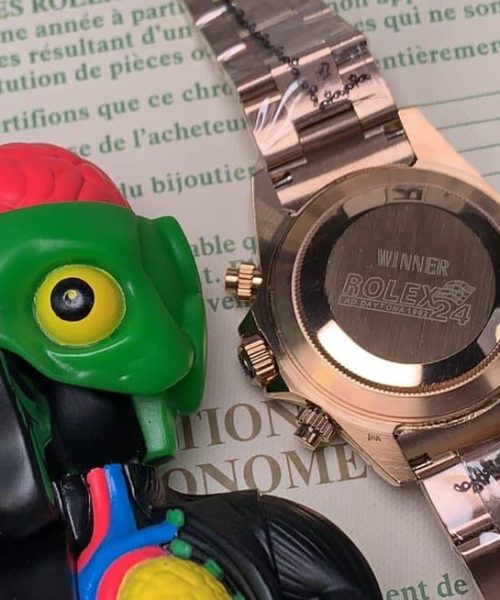 Rolex Daytona Cosmograph Rainbow Crystals Bezel Gold Toned Strap Black Dial 80251