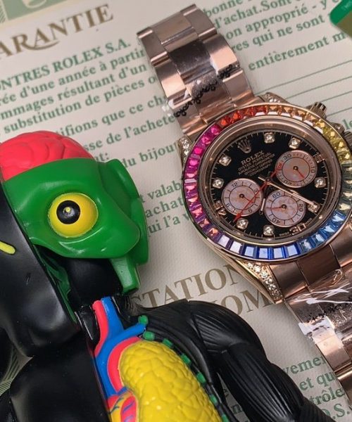 Rolex Daytona Cosmograph Rainbow Crystals Bezel Gold Toned Strap Black Dial 80251