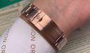 Rolex Daytona Cosmograph Rainbow Crystals Bezel Gold Toned Strap Black Dial 80251