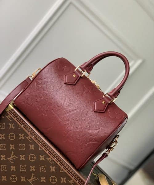 1:1 Replica Louis Vuitton LV Speedy Bandoulière 25 Monogram Empreinte Leather Wine Red Luxury Bag For Women‎ M46646 - 9.8in/ 25cm
