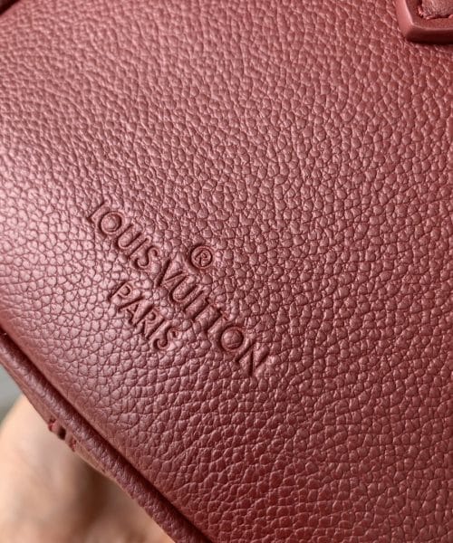 1:1 Replica Louis Vuitton LV Speedy Bandoulière 25 Monogram Empreinte Leather Wine Red Luxury Bag For Women‎ M46646 - 9.8in/ 25cm