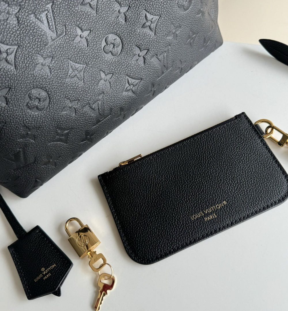 1:1 Replica Louis Vuitton LV slouchy bag monogram empreinte Luxury bag for Women M46610