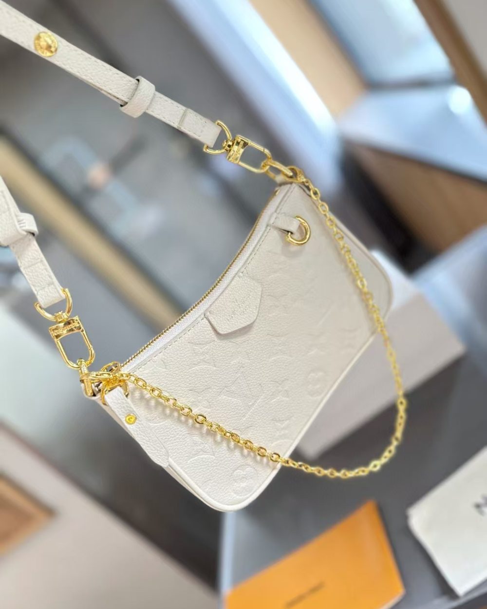 1:1 Replica Louis Vuitton LV Easy Pouch On Strap Monogram Empreinte Luxury Women Bag M81066