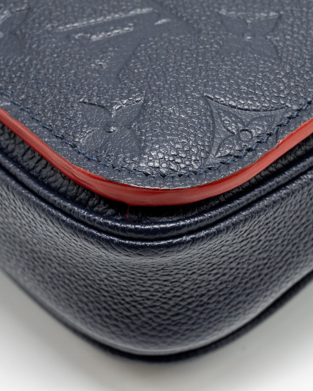AAA Replica Louis Vuitton LV POCHETTE METIS MONOGRAM EMPREINETE NAVY GHW
