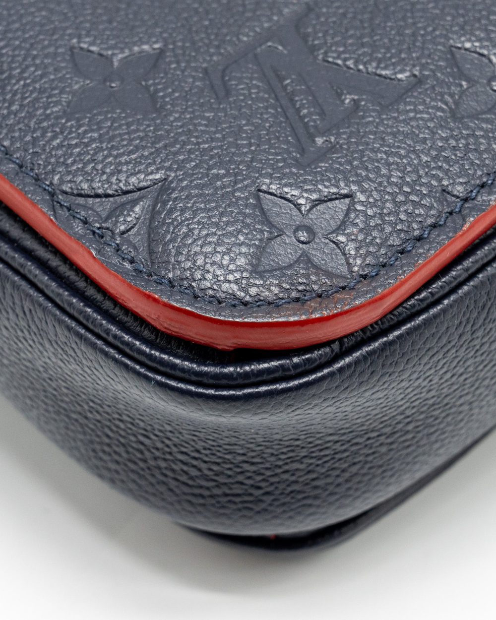 AAA Replica Louis Vuitton LV POCHETTE METIS MONOGRAM EMPREINETE NAVY GHW