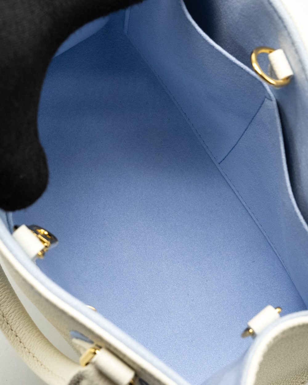 AAA Replica Louis Vuitton LV ONTHEGO PM BICOLOUR MONOGRAM EMPREINTE LATTE/CANDY BLUE GHW